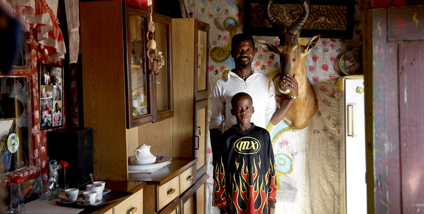 daniel and his father in their home